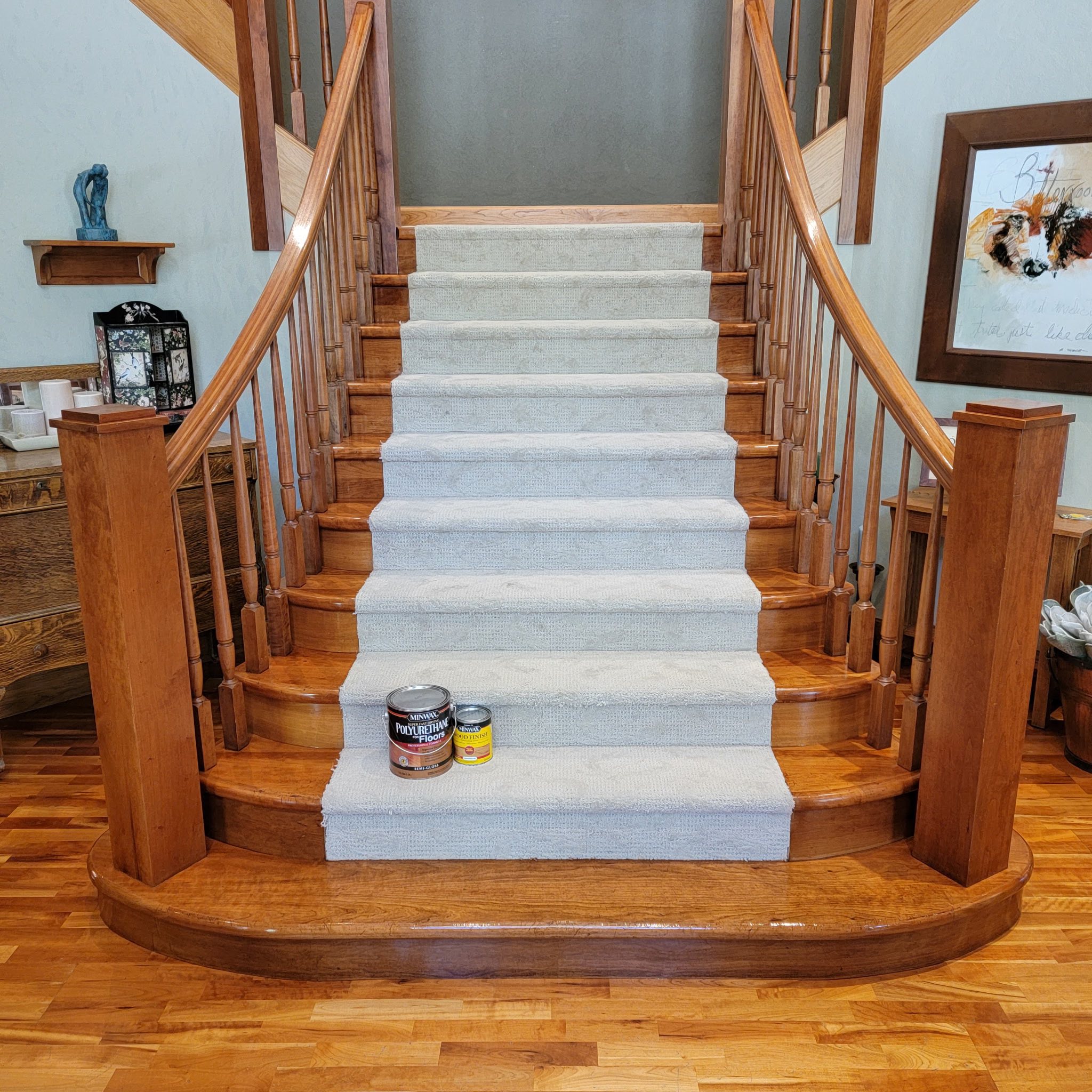 Oak staircase and railings refinished with fresh wood stain